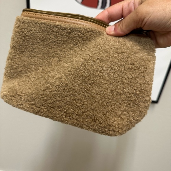 Tote Bag in cream ;Neiman Marcus
Faux Shearling Tote with makeup bag - Picture 6 of 9